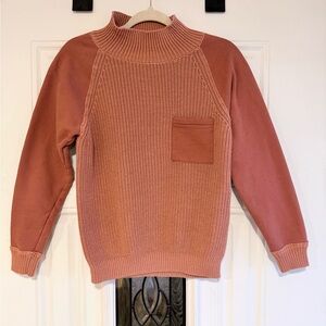 Roller orange mock neck sweater